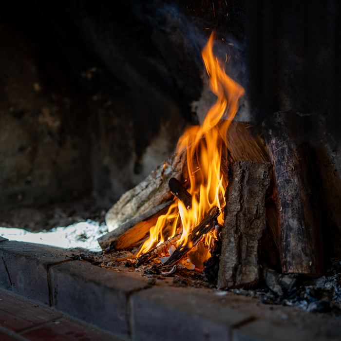 Logs burning in the open fireplace